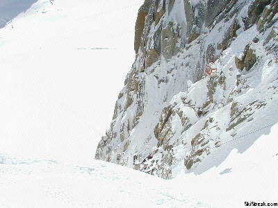 See the small, red gondola faintly visible at the right?